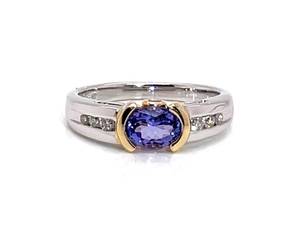 lot 27 image: Classy, Fine Semi-Bezel Set Tanzanite and Diamond Estate Ring in 14k Two-Toned Gold $3,199 Retail