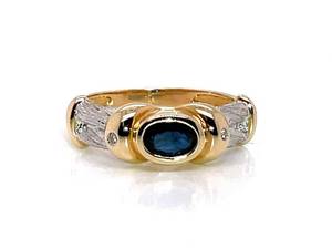 lot 38 image: Exquisite 14k Yellow and White Gold Oval Sapphire Ring with Diamond Accents $3,150 Retail