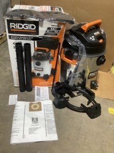lot 31 image: 16 Gal. 6.5-Peak HP Stainless Steel WetDry Shop Vacuum with Filter, Hose and Accessories by RIDGID