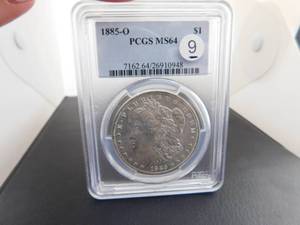 1885-O Morgan Silver Dollar PCGS MS64  PCGS Price Guide is $80