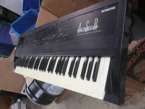 lot 210 image: ensoniq ASR 10 powers on keyboard...