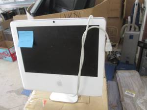 lot 217 image: white apple computer powers on ...