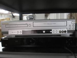 lot 219 image: 4 dvd and vhs players all power on ...