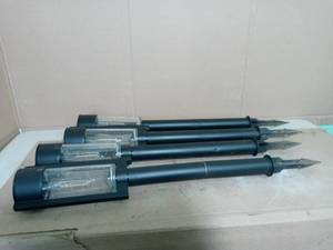 lot 16 image: Solar Black LED 15 Lumens Modern Bollard Path Light Set with Vintage Bulb (4-Pack) by Hampton Bay-  used