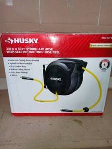 lot 80 image: 38 in. x 50 ft. Hybrid Retractable Hose Reel by Husky- open box not used