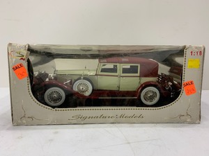 lot 239 image: Signature Models 1930 Packard Lebaron