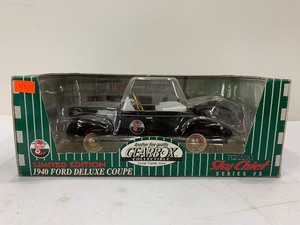 lot 247 image: Gearbox Texaco Sky Chief 1940 Ford Deluxe Coupe - Black