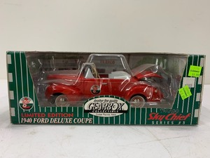lot 253 image: Gearbox Texaco Sky Chief 1940 Ford Deluxe Coupe - Red
