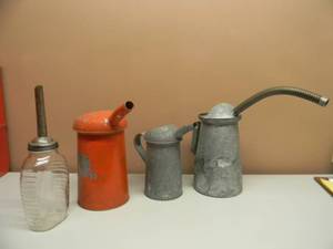 lot 27 image: Vintage Glass Automobile Oil Bottle with Embossed Metal Spout - With 3 Vintage Metal Oil Cans - Made USA - SEE PICTURES