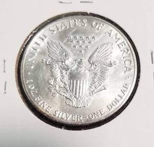 1987 AMERICAN SILVER EAGLE 1 TROY OZ. .999 FINE SILVER DOLLAR