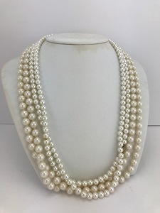 lot 27 image: Faux Pearl Necklaces & Stand (Lot of 4)