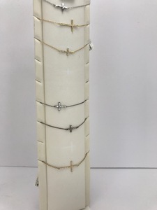 lot 28 image: Matching Cross Bracelets & Necklaces - Plus Display Stand (Lot of 7)