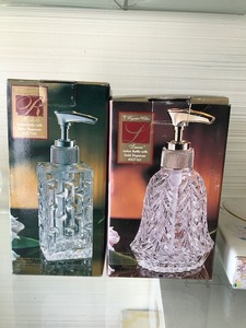 lot 70 image: Crystal Clear Industries Lotion Bottle Dispensers (Lot of 2)