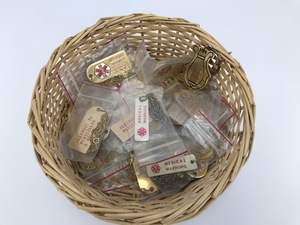 lot 89 image: Basket of Medical Tags
