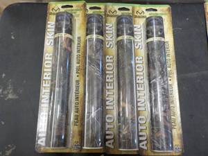 lot 68 image: Lot of 4 RealTree Camo Graphics Aut...