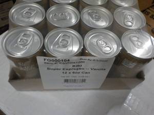 lot 153 image: 12 - 6 oz Cans Vanilla Kitu Super E...