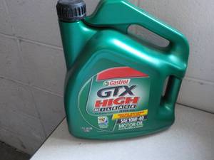 lot 228 image: 1 gallon Castrol GTX high mileage S...