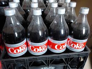 lot 232 image: Case of 12 1.25 liter Diet Coke...