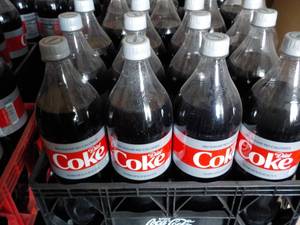 lot 235 image: Case of 12 1.25 liter Diet Coke...