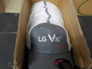 lot 289 image: 19 T-Mobile hats new with tags...