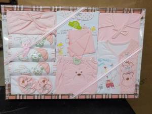 lot 303 image: Pink Baby Gift Set...