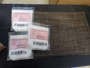 lot 410 image: 12 placemats and 3 16 oz. bags Zero...