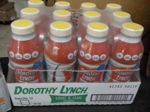 lot 443 image: Case of 12 16 oz. bottles Dorothy L...