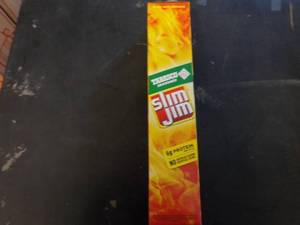 lot 460 image: Box of Slim Jims Tabasco near or p...