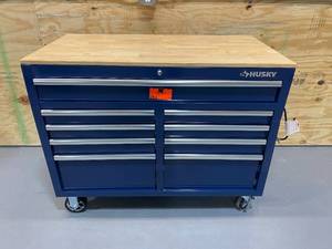 lot 16 image: Husky 46 in. W 9-Drawer, Deep Tool Chest Mobile Workbench in Gloss Blue with Hardwood Top