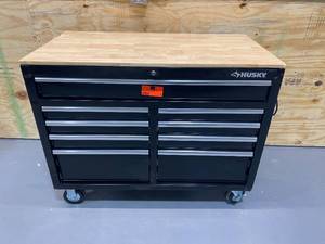 lot 17 image: HUSKY 46 in. W 9-Drawer, Deep Tool Chest Mobile Workbench in Gloss Black with Hardwood Top