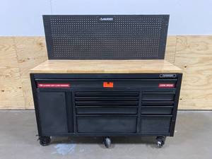 lot 99 image: HUSKY Heavy-Duty 61 in. W, Deep 10-Drawer 1-Door Tool Chest Mobile Workbench in Matte Black with Flip-up Pegboard