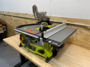 lot 106 image: RYOBI 13 Amp 8-14 in. Table Saw