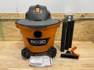 lot 118 image: RIDGID 16 Gal. 5.0-Peak HP WetDry Shop Vacuum with Filter, Hose and Accessories