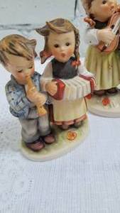 lot 57 image: Collection of 3 Western German Hummel Figurines