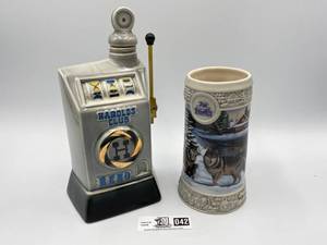 lot 042 image: Vintage Beer Stein and Liquor Decanter (Valued  $75)