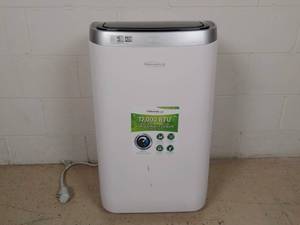 lot 420 image: 12,000 BTU Air Conditioner W Remote & quick-install window kit
