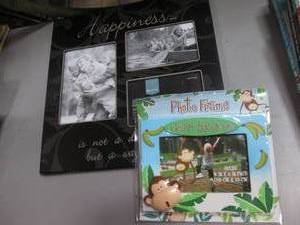 lot 38 image: 2 Picture frame lot. One is a cute ...