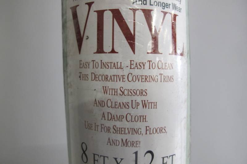 lot 115 image: Natco Assorted 8 ft. x 12 ft. Black Marble Vinyl Unbound Remnant