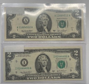 lot 55 image: Two 2003 A $2 Federal Reserve Notes I01444400A & A11664512A
