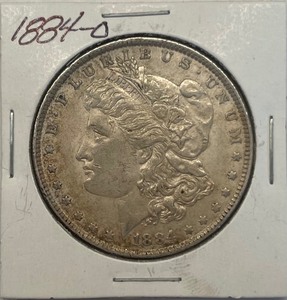 lot 24 image: 1884-O Morgan Silver Dollar