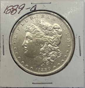 lot 21 image: 1889-O Morgan Silver Dollar