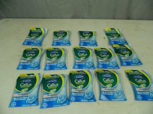 lot 80 image: 14 New Packs of Dr Scholls Callus Removers