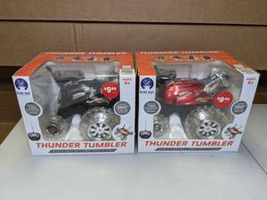 lot 195 image: Pair of Thunder Tumbler Radio Control 360 Degree Rally Cars - NEW