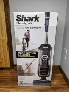 lot 13 image: Brand New Shark Navigator Swivel Pro Complete Upright Vacuum