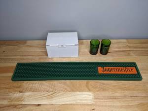 lot 164 image: 6 Brand New Jagermeister Shot Glasses and Bar Mat