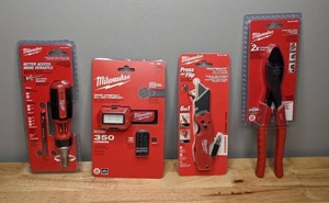 lot 160 image: Brand New Milwaukee Items Ratchet, Head Lamp, Utility Knife, Pliers