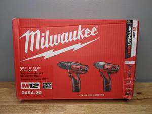 lot 14 image: Brand New Milwaukee M12 12-Volt Lithium-Ion Cordless Drill Driver & Impact Driver Combo Kit w 1.5Ah Batteries & Charger