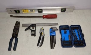 lot 134 image: Level, Drill Bits, Allen Wrenches, Utility Knife, Pry Bar, Wire Cutter, etc.