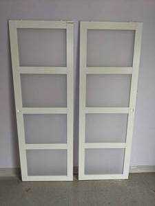 lot 310 image: Pair of Manufactured Wood and Glass Closet Doors