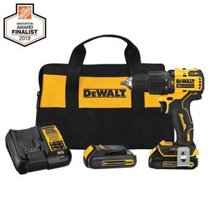 Dewalt ATOMIC 20-Volt MAX Cordless Brushless Compact 12 in. Hammer Drill, (2) 20-Volt 1.3Ah Batteries, Charger & Bag, DCD709C2 - Slightly Used.